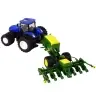 Blue tractor with baler