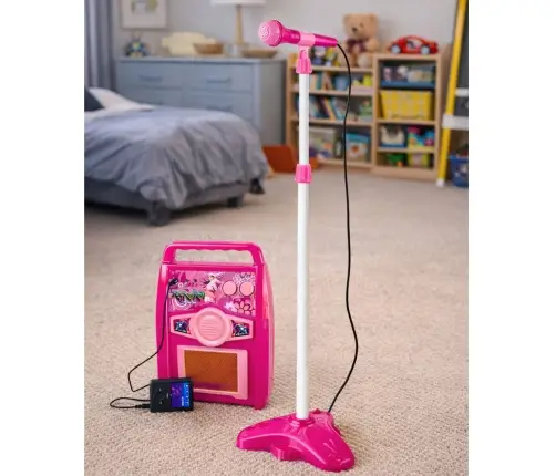 Pink electric guitar with microphone and amplifier