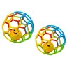 Colorful rubber ball with a rattle and a bell for a baby