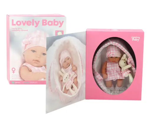 Baby doll in a bunny carrier in a pink checkered outfit Baby doll in a bunny carrier in a pink checkered outfit