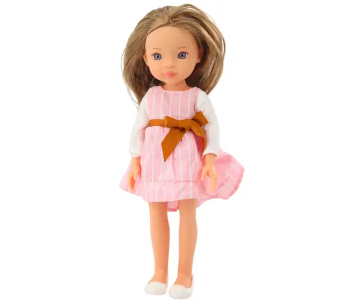 Doll in a pink dress with a bow, long brown hair Doll in a pink dress with a bow, long brown hair