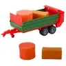 Agricultural Farm Tractor with Green Trailer and Hay Red